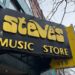 Yellow and black store sign