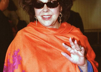 Liz Taylor Arrives In London