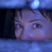 Michelle Mancini looking in the rearview mirror in Urban Legend