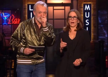 Graham Norton and Tina Fey onstage during the monologue for SNL UK