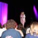 Drag show host Dee Dee Purr addressing the audience. Photo by Skylar Jensen.