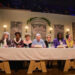Cast members of Saturday Night Live UK sit at a long table resembling the Last Supper, with an actor playing David Attenborough in the middle, and others including Freddie Mercury and Winston Churchill alongside him