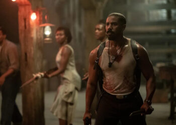 Michael B. Jordan, right, in "Sinners."