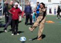 The Duchess of Sussex takes a penalty during a visit to the QuestScope Youth Centre at the Za'atari refugee camp in northern Jordan