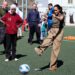 The Duchess of Sussex takes a penalty during a visit to the QuestScope Youth Centre at the Za'atari refugee camp in northern Jordan