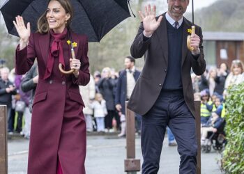 Prince William, pictured with wife Catherine in Wales on February 26, was all smiles amid the recent Royal Family crisis resulting from the arrest of his uncle Andrew Mountbatten-Windsor
