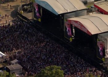 aerial footage of crowd at music festival
