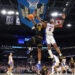 Cam Manyawu #3 of the Iowa Hawkeyes shoots the ball against Boogie Fland #0 of the Florida Gators during the second half in the second round of the 2026 NCAA Men's Basketball Tournament at Benchmark International Arena on March 22, 2026 in Tampa, Florida.
