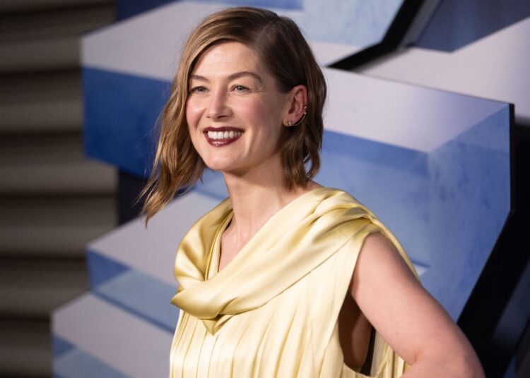 Rosamund Pike attends Lionsgate's "Now You See Me: Now You Don't" New York premiere at The Lighthouse at Chelsea Piers
