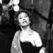 A glamorous older woman poses dramatically in "Sunset Boulevard"