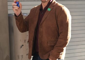 Image may contain Chris Pratt Blazer Clothing Coat Jacket Face Head Person Photography Portrait Pants and Adult