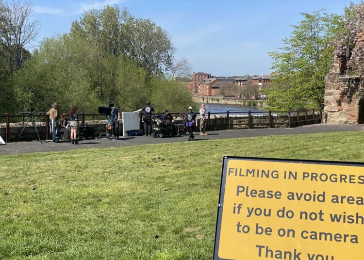 Actors spotted filming new movie outside city landmark