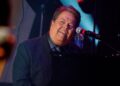 Alan Osmond performs during a taping of the Osmonds 50th anniversary show in Las Vegas on Aug. 14, 2007. (AP Photo/Isaac Brekken, File)