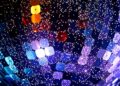 An abstract close-up image featuring a dramatic, high-contrast composition of shimmering sequins and glittering disco ball textures, capturing the glamorous and celebratory mood of a musical comeback.