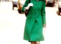 Image may contain Anne Hathaway Clothing Coat Person Adult and Overcoat