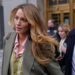 Blake Lively leaves a courthouse in New York, Wednesday, Feb. 11, 2026, who came to the courthouse to see if her lawsuit alleging sexual harassment on the set of the 2024 romantic drama “It Ends With Us” could be settled before a May trial. (AP Photo/Seth Wenig)