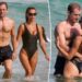 Brooks Nader and Taron Egerton take a dip during romantic Australia beach date