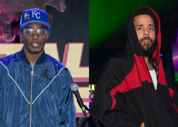 Two men are pictured: Cam'ron in a blue jacket and KC cap, and J. Cole in a black and red hooded outfit, both in front of colorful backdrops.