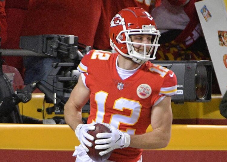 Jan 20, 2019; Kansas City, MO, USA; Kansas City Chiefs wide receiver Gehrig Dieter (12) celebrates after scoring a touchdown against the New England Patriots during the second half of the AFC Championship game at Arrowhead Stadium. Mandatory Credit: Denny Medley-Imagn Images