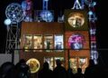 Festival goers observe 'hippos' at exhibit