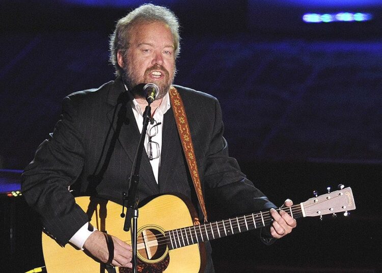 Don Schlitz performing with guitar at Songwriters Hall of Fame gala