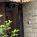 Entryway with a welcome banner and greenery