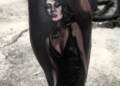 A photo of a tattoo of a woman
