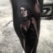 A photo of a tattoo of a woman