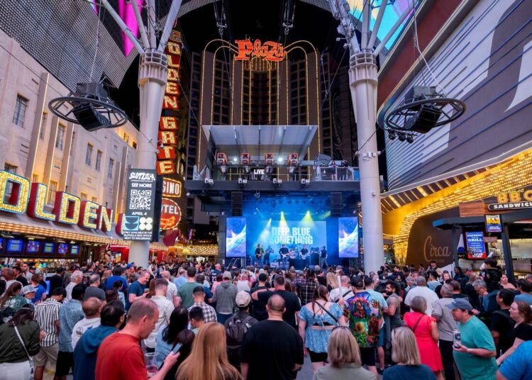 A shot of the frivolity at "90s House Party" at The Canopy at Fremont Street Experience on Satu ...