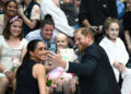 Harry and Meghan greeted by crowds during visit to Royal Children’s Hospital in Melbourne