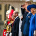 US President, Donald Trump, salutes at a welcome ceremony at Windsor Castle at the start of his State Visit. King Charles stands at his side. Queen Camilla, in royal blue, is at the front of the line up in the photo.