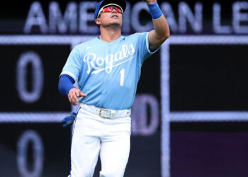 Left fielder Isaac Collins of the Kansas City Royals makes a catch during the fourth inning of the game against the Minnesota Twins at Kauffman Stadium on April 02, 2026 in Kansas City, Missouri.