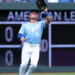 Left fielder Isaac Collins of the Kansas City Royals makes a catch during the fourth inning of the game against the Minnesota Twins at Kauffman Stadium on April 02, 2026 in Kansas City, Missouri.