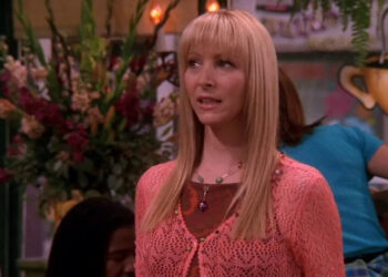 Phoebe looking thoughtful while speaking in Friends.