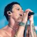 Yungblud singing on stage in Birmingham