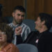Ronald and James Marsden sitting together in Jury Duty.