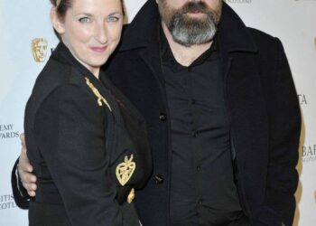 Greg Hemphill with his arm around Julie Wilson Nimmo