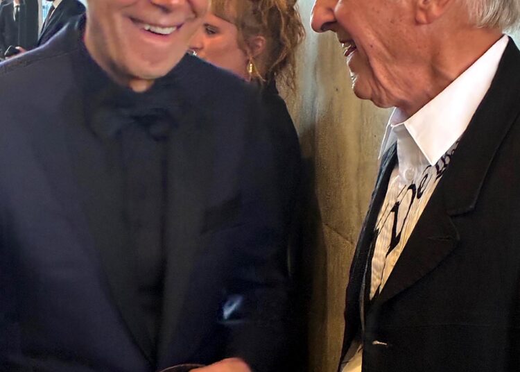 Jeff Koons talks with Ed Ruscha.