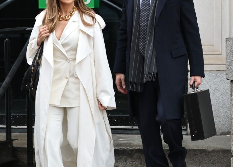 Jennifer Lopez and Brett Goldstein are seen filming at the "Office Romance" movie set on April 07, 2025 in Hoboken, New Jersey.