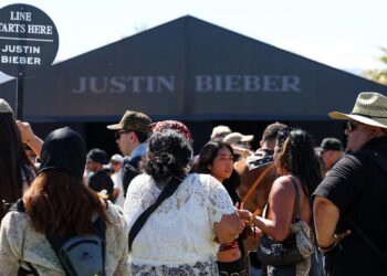 Justin Bieber fans line up infront of his store during the 2026 Coachella festival