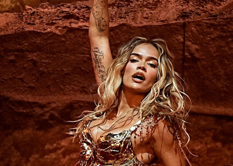 Karol G performs her headlining set on the Coachella Stage at the Coachella Valley Music and Arts Festival in Indio, Calif., on Sunday, April 19, 2026.