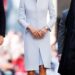 Image may contain Person Adult People Head Clothing Coat and Face