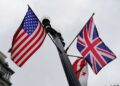 U.S., Union Jack, and Washington, D.C., flags fly in the wind near the White House ahead of Britain’s King Charles and Queen Camilla’s visit to the United States