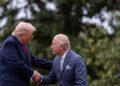 King Charles, right, President Donald Trump, left, shake hands during a State Visit arrival ceremony on the South Lawn of the White House, Tuesday, April 28, 2026, in Washington.