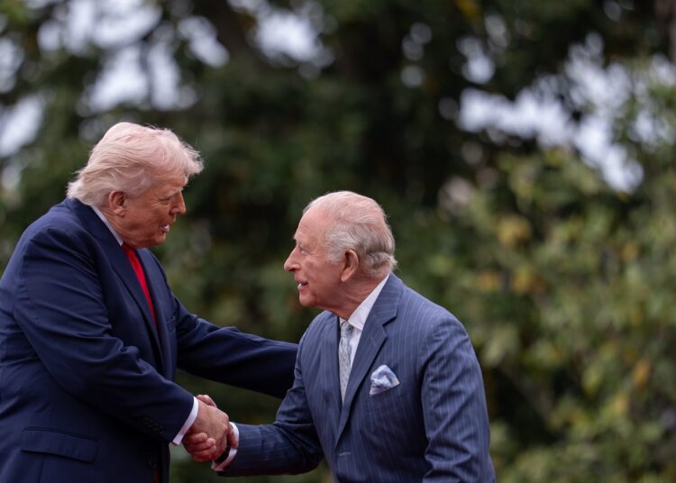 King Charles, right, President Donald Trump, left, shake hands during a State Visit arrival ceremony on the South Lawn of the White House, Tuesday, April 28, 2026, in Washington.