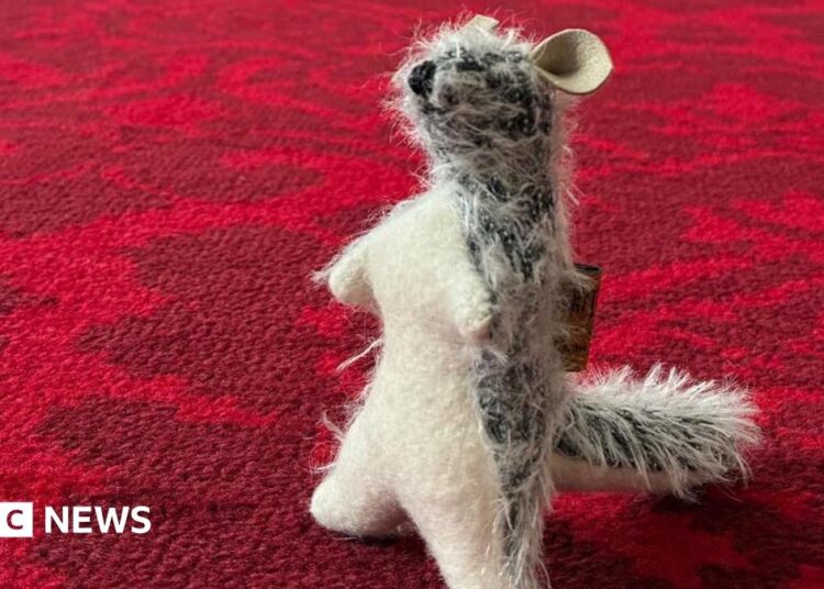 Roo on the carpet at Buckingham Palace - it's a teddy bear on that looks like the character from Winnie-the-Pooh