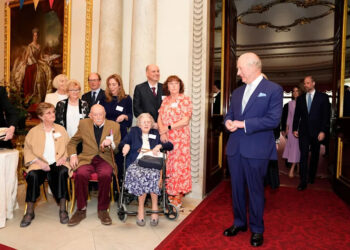 King Charles III meets (front left-right) 100 year-olds Joan Illingworth, John Jervois and Mary Wood during a reception at Buckingham Palace in London to celebrate the 100th anniversary of Queen Elizabeth II's birth (Jordan Pettitt/PA Wire)