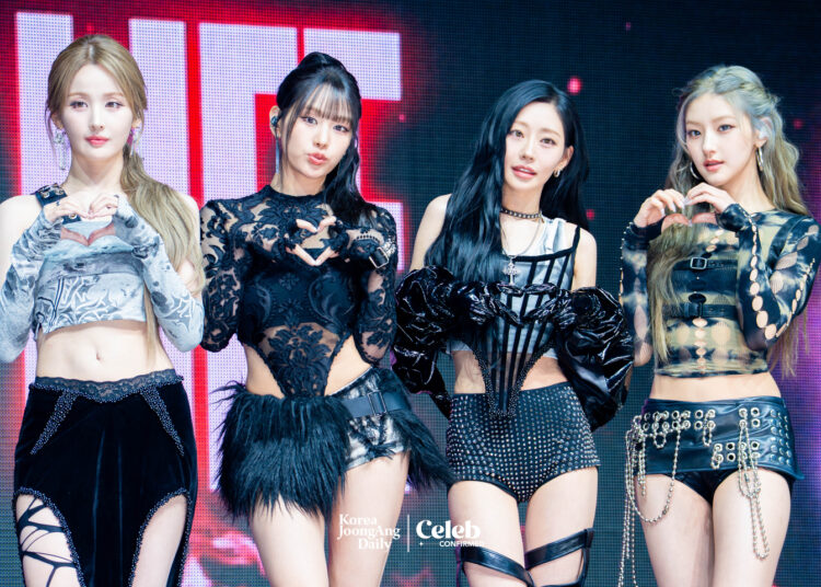 Girl group Kiss of Life poses for photos during a showcase for the release of its second single, “Who is she,” at Blue Square in central Seoul on April 6. [DANIELA GONZALEZ PEREZ]