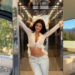 A person poses in various settings including a vehicle, an elevator, and a balcony with a scenic view.