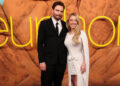 Euphoria creator Sam Levinson and actress Sydney Sweeney (right) attending the LA premiere for the new series earlier this week. He is wearing a black suit and tie and she is wearing a white dress.